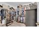 A spacious walk-in closet offers ample storage and organization at 328 Wild Plum Ln, Las Vegas, NV 89107