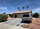 Charming single-story home featuring a desert-landscaped front yard and attached two-car garage at 4244 Gibraltar St, Las Vegas, NV 89121
