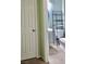 Cozy half bath with pedestal sink and an over-the-toilet storage rack at 4590 Lime Straight Dr, Las Vegas, NV 89115