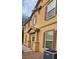 Two-story house featuring neutral exterior, brown shutters, and a covered entry at 4590 Lime Straight Dr, Las Vegas, NV 89115
