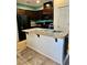 Charming kitchen features granite countertops, an island with a sink, and stainless steel appliances at 4590 Lime Straight Dr, Las Vegas, NV 89115