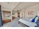 Bright main bedroom with soft carpet, a walk in closet and a window with a treed view at 4770 Armada Ridge Ct, Las Vegas, NV 89129