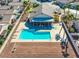 Aerial view showcasing a large private pool, spa, covered patio, and ample yard space at 5114 Mascaro Dr, Las Vegas, NV 89122
