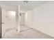 Bright, secondary bedroom with mirror closet doors and neutral carpet at 5114 Mascaro Dr, Las Vegas, NV 89122