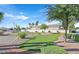 Community putting green enhances this property's appeal, nestled among lush landscaping at 5114 Mascaro Dr, Las Vegas, NV 89122