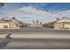 The Sterling community entrance features mature landscaping, providing a welcoming atmosphere at 5114 Mascaro Dr, Las Vegas, NV 89122