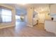 Open layout kitchen with white cabinets and stainless steel appliances at 8101 W Flamingo Rd # 2059, Las Vegas, NV 89147