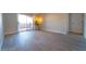 Neutral living space with sliding glass door and modern flooring at 8101 W Flamingo Rd # 2059, Las Vegas, NV 89147