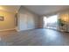 Spacious living room with patio access, high ceilings, and neutral walls at 8101 W Flamingo Rd # 2059, Las Vegas, NV 89147