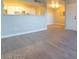 Bright living area with modern floors leading to an open kitchen at 8101 W Flamingo Rd # 2059, Las Vegas, NV 89147