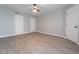 Spacious bedroom with laminate floors, ceiling fan and neutral walls at 8101 W Flamingo Rd # 2059, Las Vegas, NV 89147