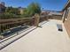 Balcony overlooking the backyard and neighborhood with clear blue skies at 8303 Saddleback Ledge Ave, Las Vegas, NV 89147