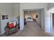 The view into the main bedroom shows natural lighting and views to the ensuite living area at 8303 Saddleback Ledge Ave, Las Vegas, NV 89147