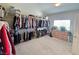 Spacious walk-in closet with ample storage and custom shelving at 8303 Saddleback Ledge Ave, Las Vegas, NV 89147