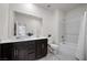 Clean bathroom with double vanity sinks, a large mirror, and a shower-tub combination at 888 Cherry Glen Pl, Las Vegas, NV 89138