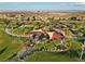 Aerial view of an elaborate community playground featuring colorful shade structures and desert landscaping at 888 Cherry Glen Pl, Las Vegas, NV 89138