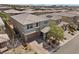 Charming two-story home with a well-manicured yard, a two-car garage, and a beautiful desert landscape at 888 Cherry Glen Pl, Las Vegas, NV 89138