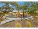 Beautiful community playground in a landscaped park setting with shade canopies and play equipment at 888 Cherry Glen Pl, Las Vegas, NV 89138