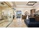 Opulent bathroom with a large walk-in shower, vanity area, and access to gym equipment at 1123 Christian Rd, Henderson, NV 89002