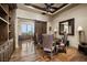 Open dining room with hardwood floors, barn doors, and natural light at 1123 Christian Rd, Henderson, NV 89002