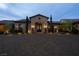 Stunning stone-clad home with a manicured front yard and an inviting entrance at 1123 Christian Rd, Henderson, NV 89002