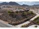 Expansive desert home with stone wall, tiled roof and mountain views at 1123 Christian Rd, Henderson, NV 89002