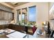Functional home office with built-in storage, large windows, and stylish decor at 1123 Christian Rd, Henderson, NV 89002