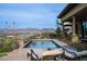 Pool with lounge chairs overlooking the desert hills at 1123 Christian Rd, Henderson, NV 89002