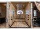 Luxurious shower with glass doors and rainfall shower head at 1123 Christian Rd, Henderson, NV 89002