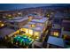 Aerial view showcasing a backyard oasis complete with a pool, spa, and outdoor lounge area at 11990 Montague St, Las Vegas, NV 89138