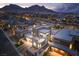 Aerial view of a modern home with mountain views in the background at 11990 Montague St, Las Vegas, NV 89138