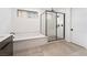 Bright bathroom features a tub, glass shower, and modern fixtures at 11990 Montague St, Las Vegas, NV 89138