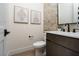 Elegant powder room with modern fixtures and stylish decor with white counter at 11990 Montague St, Las Vegas, NV 89138