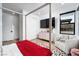 Comfortable bedroom features plush bedding, plenty of natural light, and a cozy chair at 11990 Montague St, Las Vegas, NV 89138