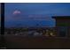 Stunning city skyline view from the balcony, offering a mesmerizing backdrop for relaxation and entertainment at 11990 Montague St, Las Vegas, NV 89138