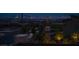 Stunning Las Vegas skyline view from the home's vantage point showcasing the city lights at 11990 Montague St, Las Vegas, NV 89138