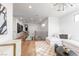 Open floor plan with modern decor and staircase leading to other floors at 11990 Montague St, Las Vegas, NV 89138