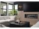 Bright living room showcases a fireplace and stylish decor at 11990 Montague St, Las Vegas, NV 89138