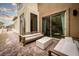Inviting outdoor patio with comfortable seating and elegant design, offering a relaxing retreat at 11990 Montague St, Las Vegas, NV 89138
