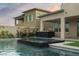 Stunning backyard pool with built-in spa and outdoor kitchen, perfect for luxury living at 11990 Montague St, Las Vegas, NV 89138