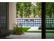 Elegant pool view with patterned tile waterfall feature and lush landscaping, creating a relaxing oasis at 11990 Montague St, Las Vegas, NV 89138