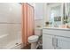 Bathroom featuring shower with glass door, white vanity with sink, and neutral paint at 12356 Notch Trail Ave, Las Vegas, NV 89138