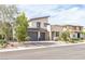 Modern home with desert landscaping, three car garage and stone accents at 12356 Notch Trail Ave, Las Vegas, NV 89138