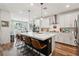 Beautiful kitchen with a large island, modern appliances, and plenty of cabinet space at 12356 Notch Trail Ave, Las Vegas, NV 89138