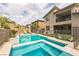 Inviting backyard pool and spa surrounded by lush landscaping for relaxation and enjoyment at 12356 Notch Trail Ave, Las Vegas, NV 89138