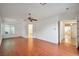 Large bedroom with wood floors, fan, and ample natural light at 2585 Portsmouth Creek Ave, Henderson, NV 89052
