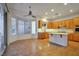 Bright kitchen with an island, stainless steel appliances and a breakfast nook at 2585 Portsmouth Creek Ave, Henderson, NV 89052