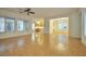 Open living area with tile flooring, natural light, and seamless flow to other spaces at 2585 Portsmouth Creek Ave, Henderson, NV 89052