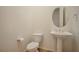 Powder room features pedestal sink, and toilet at 2585 Portsmouth Creek Ave, Henderson, NV 89052