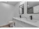 Bathroom featuring double sinks, modern faucets, and a toilet at 2851 S Valley View Blvd # 1098, Las Vegas, NV 89102